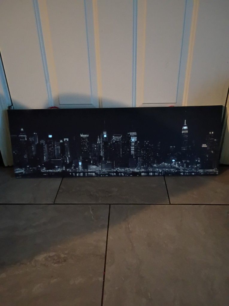 MIDTOWN MANHATTAN SKYLINE PANORAMIC VIEW AT NIGHTMIDTOWN MANHATTAN SKYLINE PANORAMIC VIEW AT NIGHT