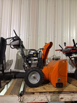 Three snowblower all two stage one is a craftsman one of the Husqvarna and one of the Troy belt