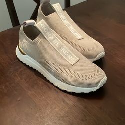 Brand new Michael Kors Sneakers. Size 7