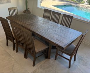 Adjustable table with eight chairs and sideboard/buffet