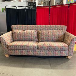 Vibrant multi-color down couch with deeps seats - Good condition