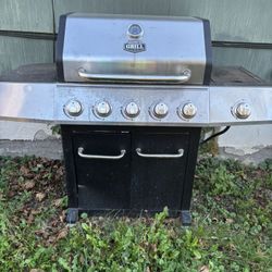 Grill And New Propane Tank