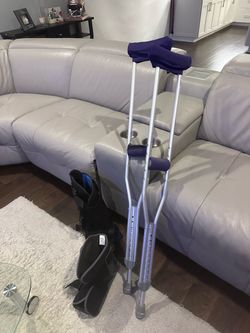 Adjustable crutches- 2 medical boots