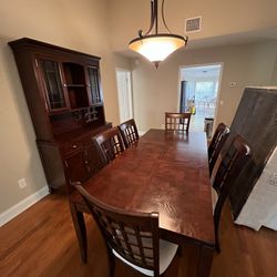 Dining room table set and armoire