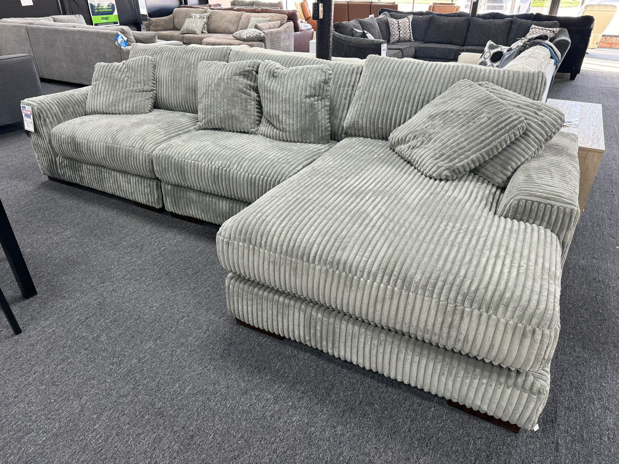 New 3 Pcs Lindyn Sectional. Ashley Furniture Best Selling Sectional. Delivery & Set Up Available. We Finance