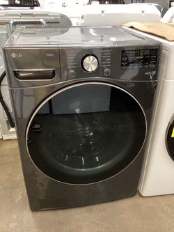 LG Thin Q 4.5 cu.ft. Front Load Washer in Black Steel with TurboWash 360 Technology New Scratch and Dent