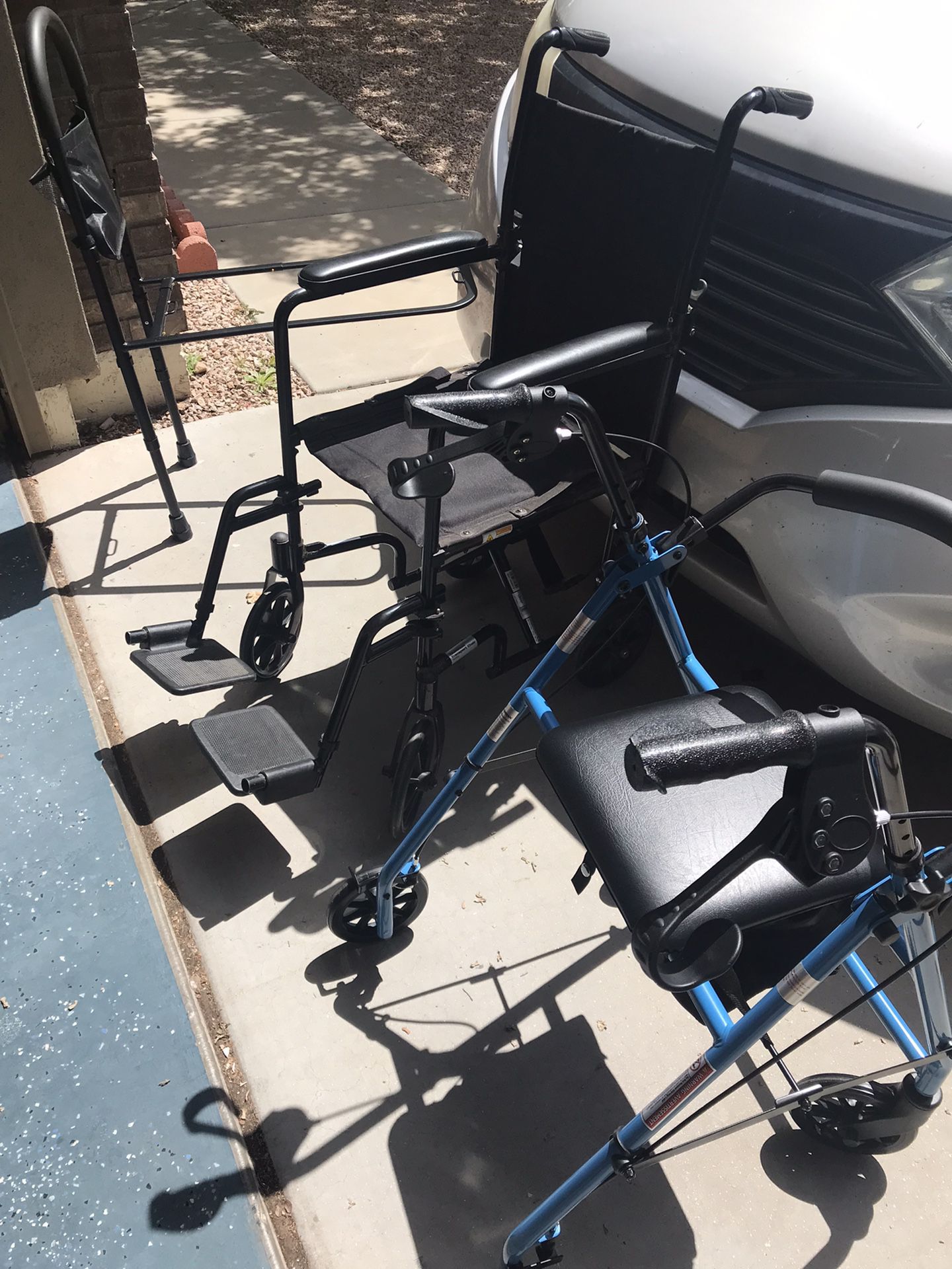 A Wheelchair And A Rolling Walker