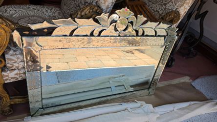 Vintage, hand-etched Venetian-style wall mirror.