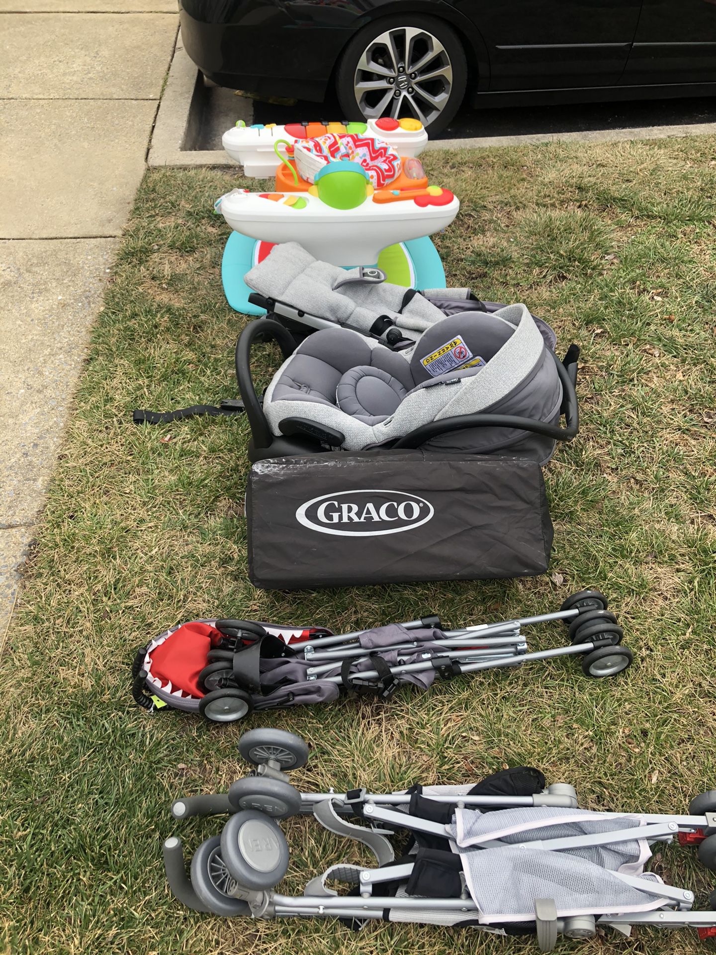 Stroller, Car seat with base, baby toys.