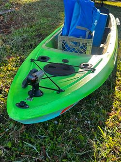 Green Sit-On-Top Fishing Kayak with clear bottom