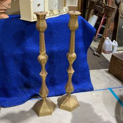 Two older tall  Brass candle holders