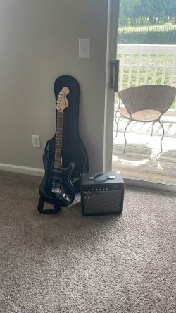 Fender guitar w/ amp