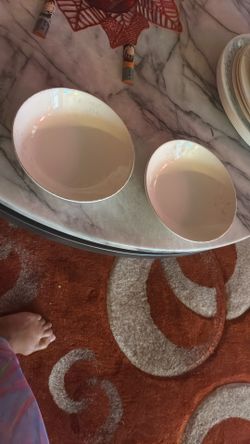 2 Copper Trimmed Bowls