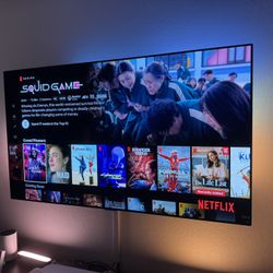 LG OLED 65” TV with Philips Hue sync Box And Lighstrip