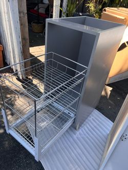 Cabinet with pull out baker