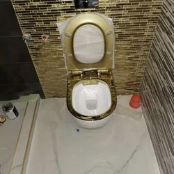 Wall mounted Gold Toilet
