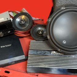 12 inch JL audio 12 W3V 3-4 performance technique 2000 W mono block Alpine 600 W Kenwood stereo  deck Two 6 1/2 Kickers And  4Gage red wire