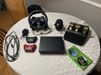 Xbox One X 1TB with Steering wheel set 2 Controllers and 2 Games