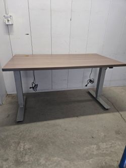 Electric Sit And Stand Ergonomic Desk disassembled for easy transport