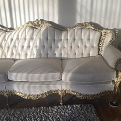 White Tufted Sofa with Gold Trim