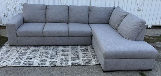 Light Gray Living Spaces Lucy L-Shape Sectional Sofa with Righthand Chaise