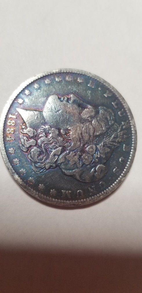 Morgan Silver Dollar 1884 Purple pink Toning