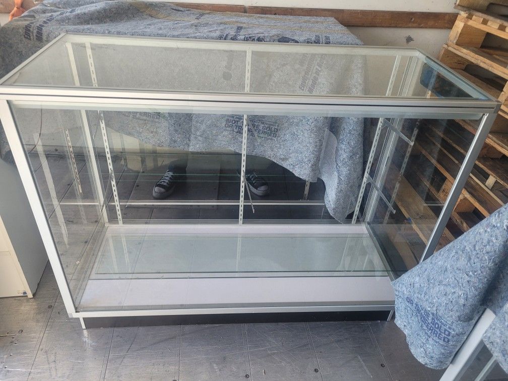 display glass showcases with shelves and doors
