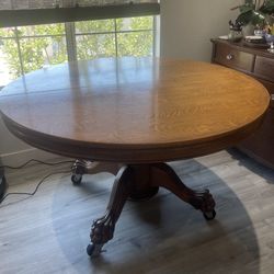 Antique Round Oak Lion Claw Foot Table