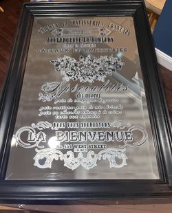 Embellished wall mirror with vintage French script