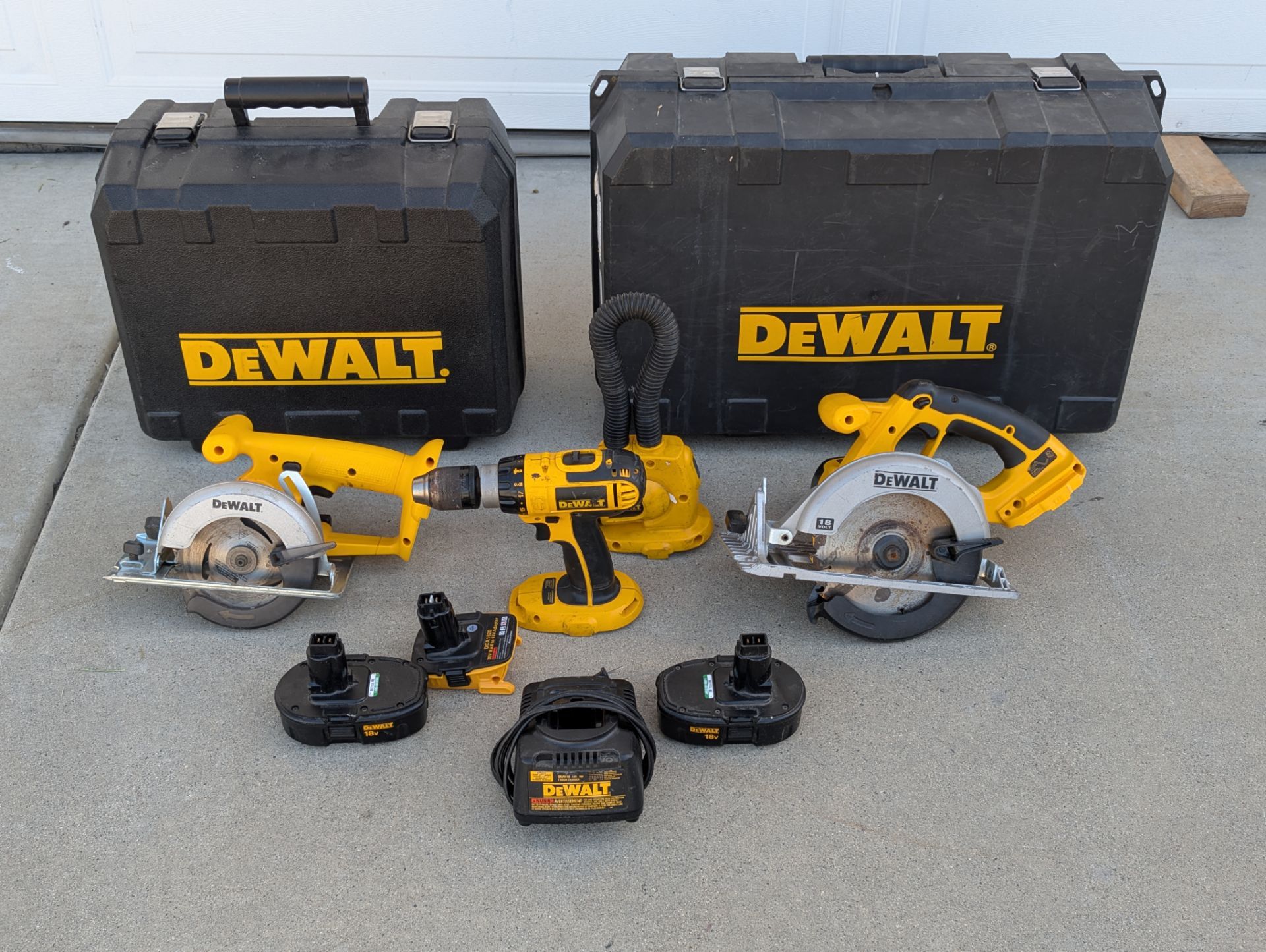 DeWalt power tool bundle with batteries and cases