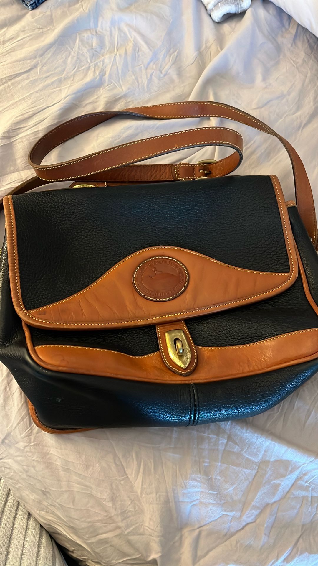 vintage Dooney & Bourke All-Weather Leather duck bag or satchel in black with tan trim
