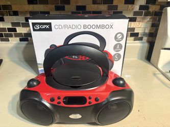 GPX boombox CD player and AM/ FM radio with cord and box