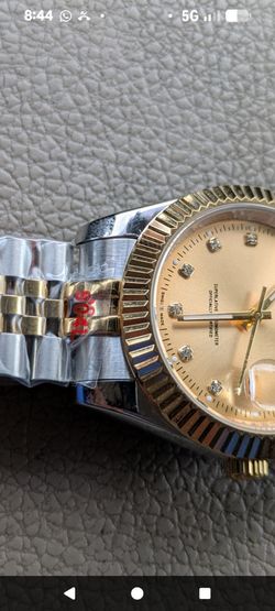 reloj  de . $200