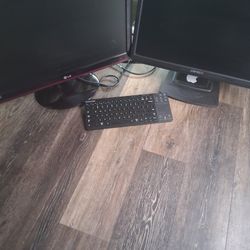 2 computer monitors and keyboard. $20