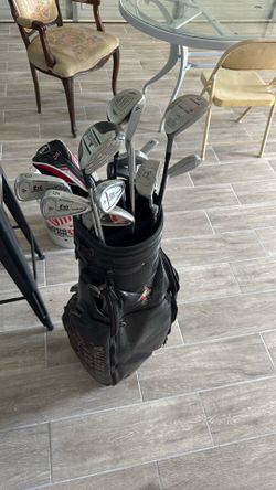 Golf clubs with a free caddy bag