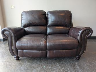 Classic Dark Brown Leather Reclining Loveseat with Nailhead Trim