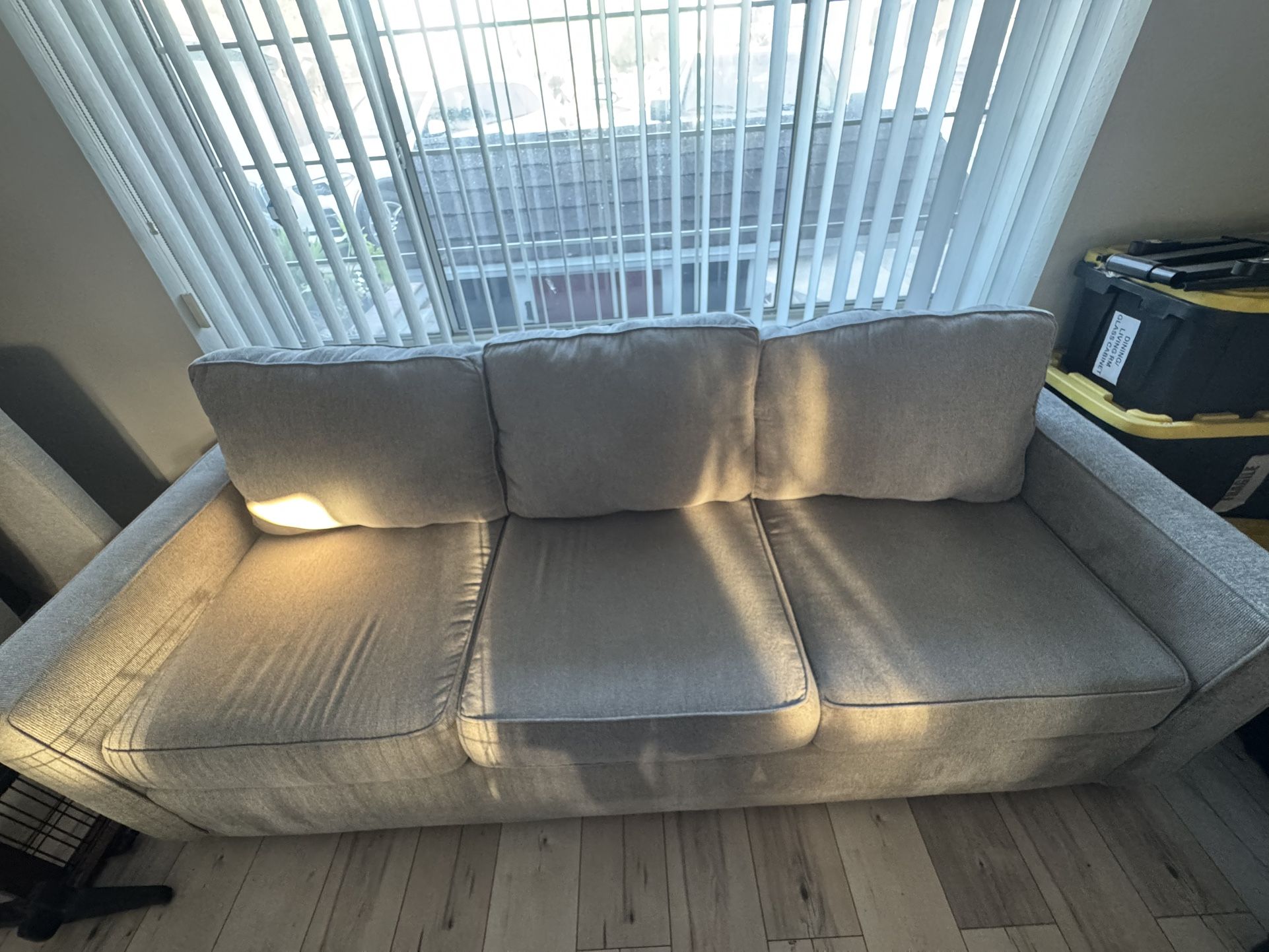 Blue/Grey Living Spaces Couch