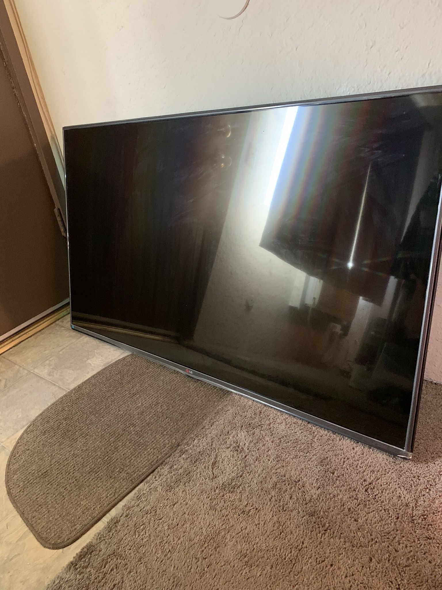 55” LG HDTV w/ Wall Mount brackets
