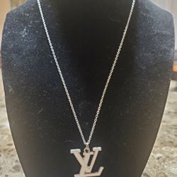 Necklace With White Charm $10