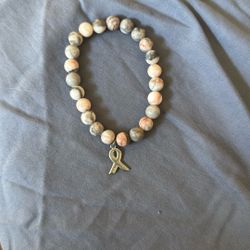 Breast cancer and Cool jaguar gold bracelet!