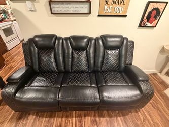 3 seater reclining black sofa