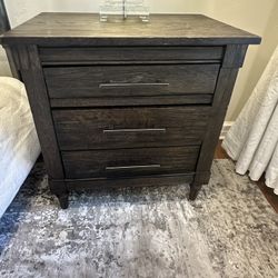 Two dark wood nightstands