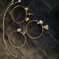 3 Bracelets And A Necklace 
