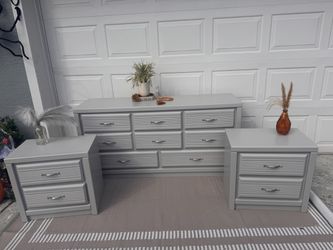 Beautiful refinished gray dresser and nightstands set. Free delivery