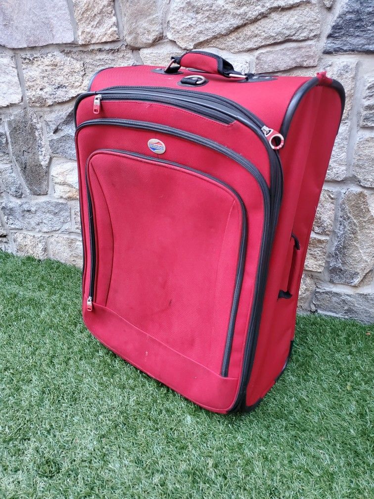 30" X 20" X 12" expandable BIG RED Suitcase On Casters $20