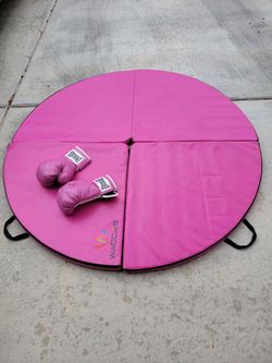 Pink Round Pole Dance Mat and pink Everlast boxing gloves