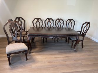 Dining table and eight chairs