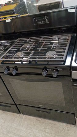 Black gas four burners everything works with warranty delivery available fee depends on address 🏠🛣️