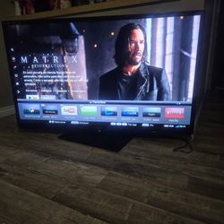 SHARP AQUOS LIQUID CRYSTAL 60" TV IN EXCELLENT CONDITION THIN SCREEN WITHOUT DAMAGE TO THE SCREEN INCLUDES POWER CABLE REMOTE CONTROL AND FURNITURE BA