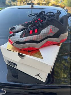Nike Jordan One Take 4 basketball shoes in a black and red "Bred" colorway